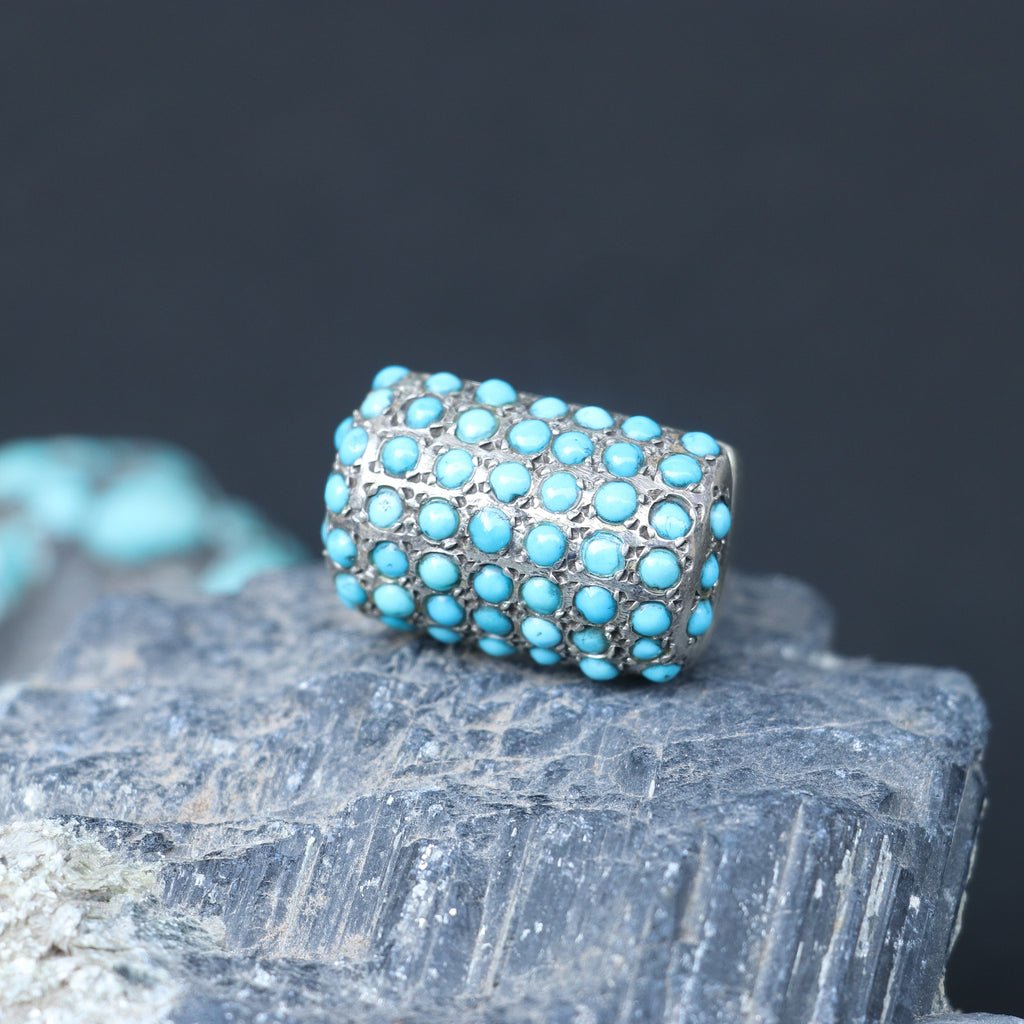 SILVER RING SET IN SMALL TURQUOISES