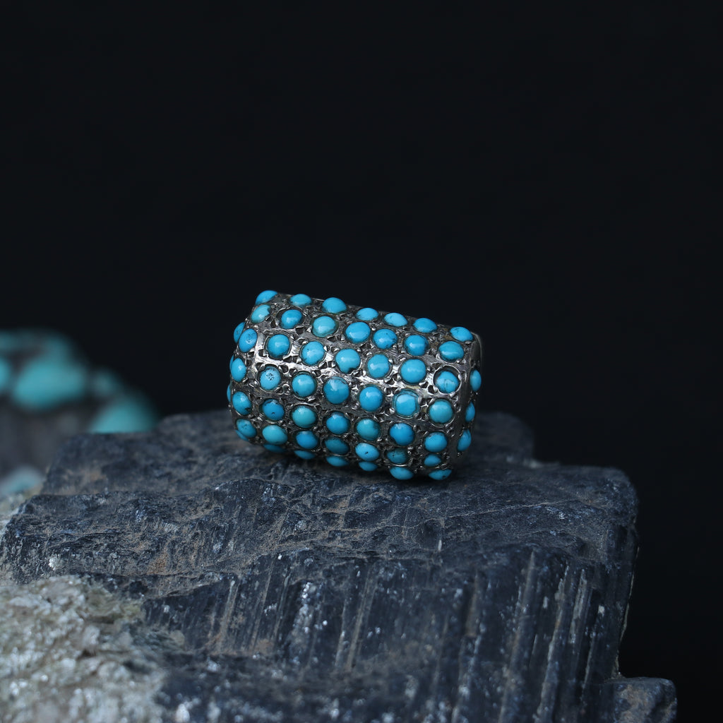 SILVER RING SET IN SMALL TURQUOISES