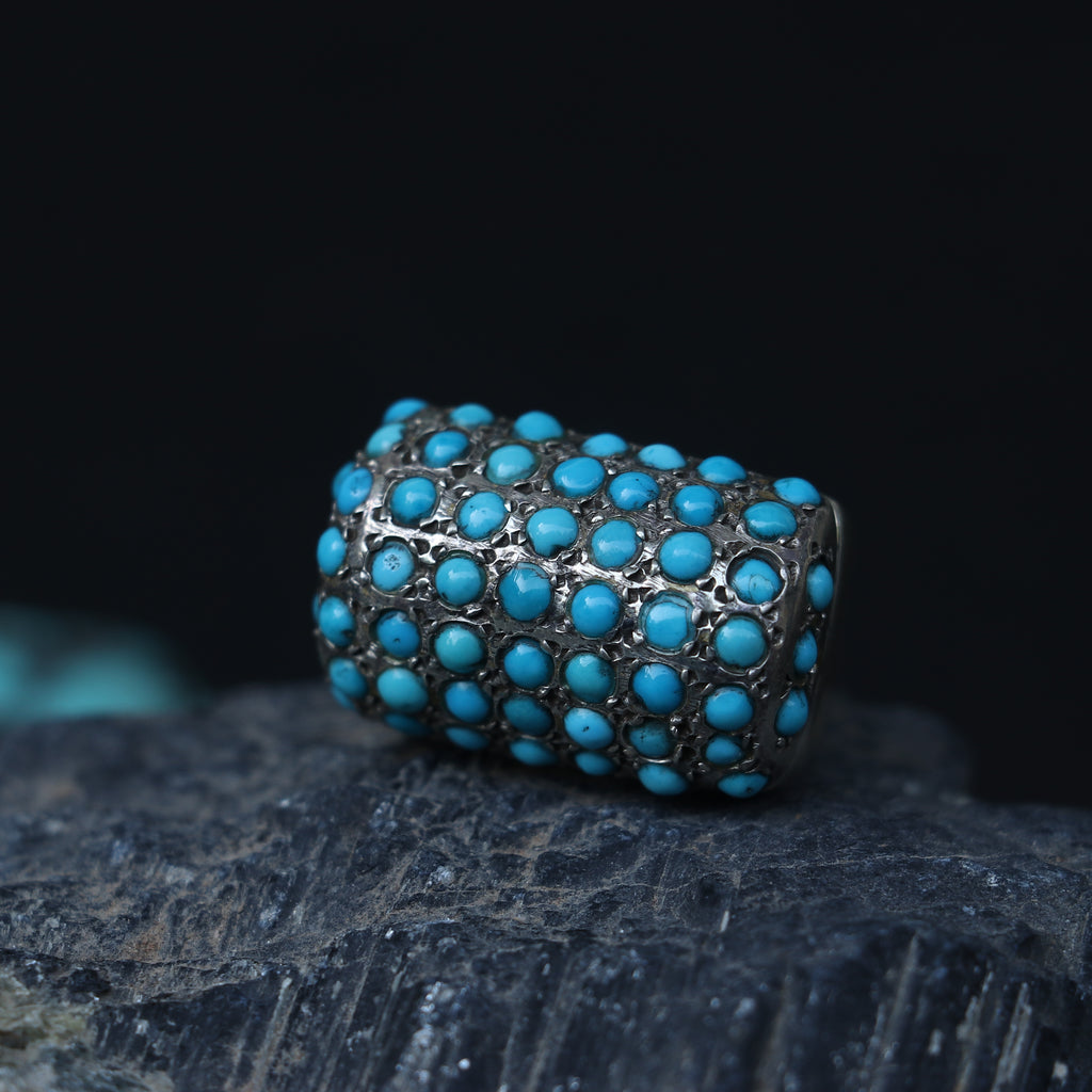 SILVER RING SET IN SMALL TURQUOISES