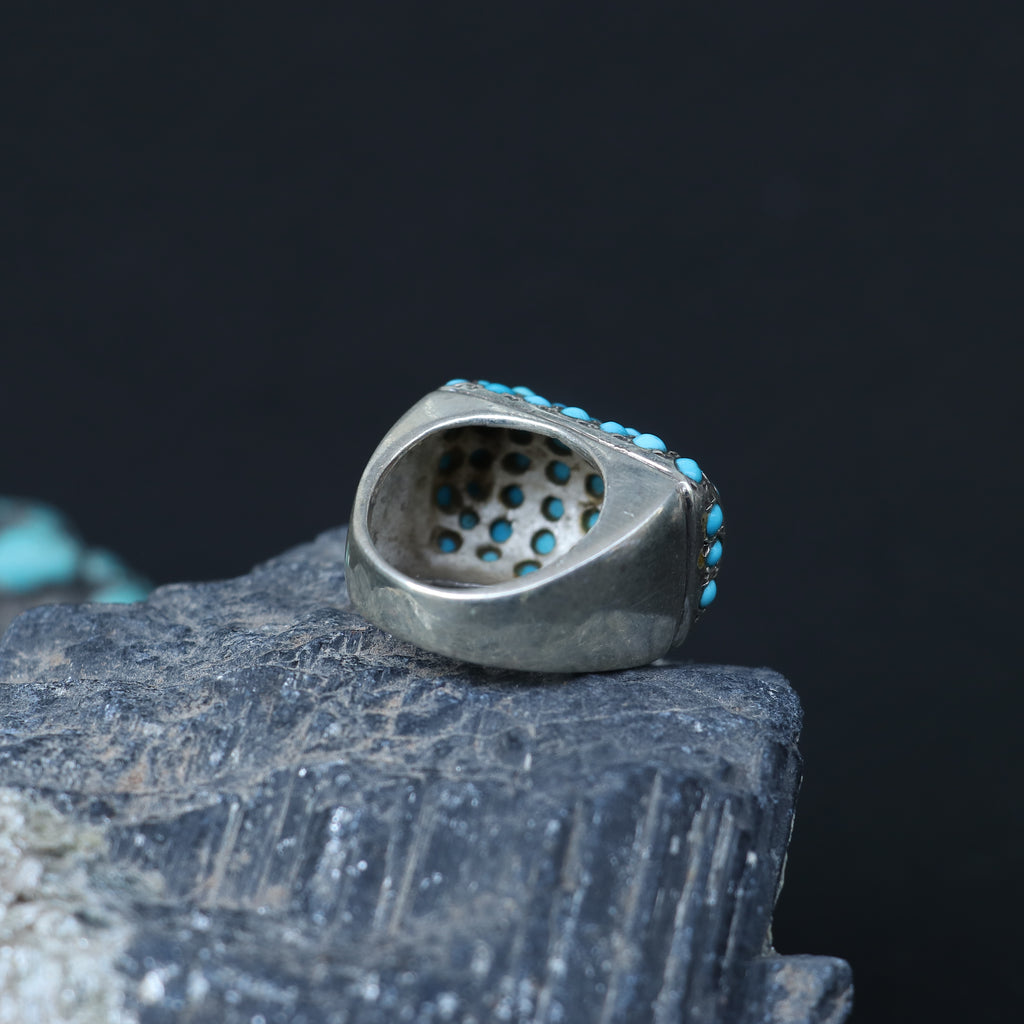 SILVER RING SET IN SMALL TURQUOISES