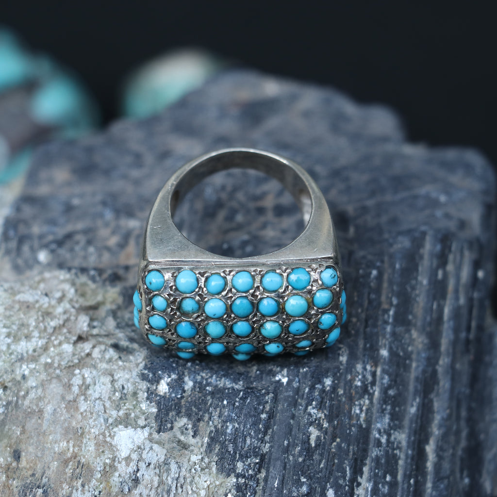 SILVER RING SET IN SMALL TURQUOISES