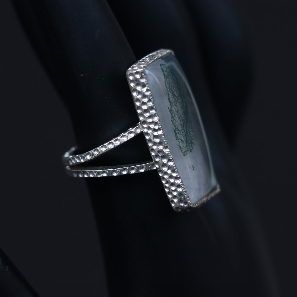 Silver ring showcasing a large rectangular moss agate stone