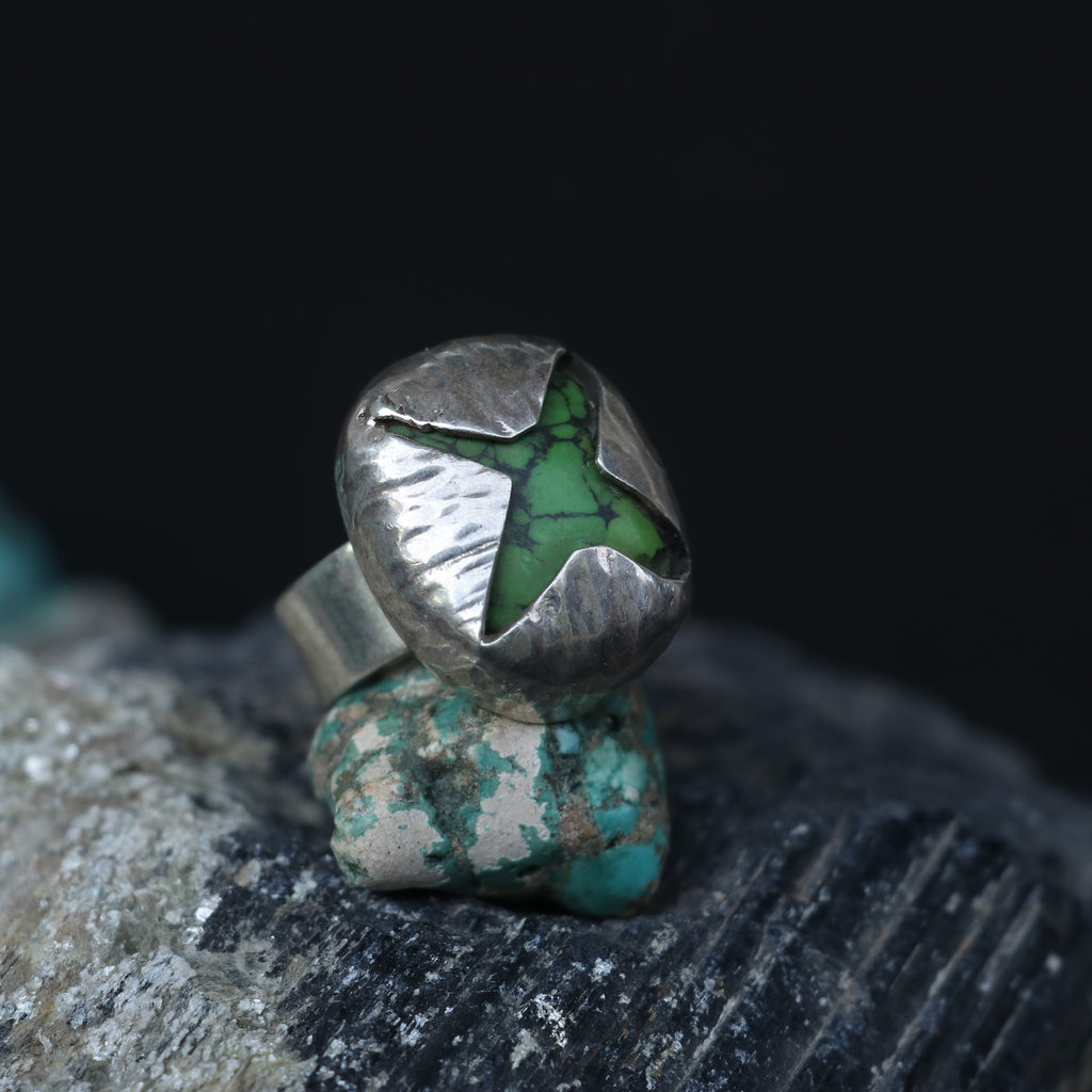 SILVER RING WITH A GREEN STAR SHAPED TURQUOISE