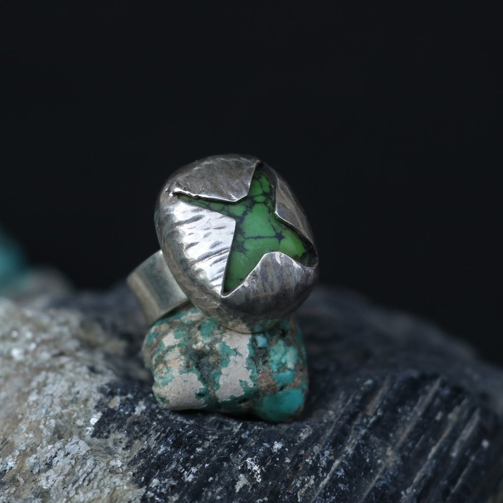 SILVER RING WITH A GREEN STAR SHAPED TURQUOISE