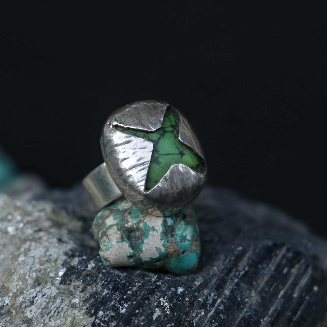 SILVER RING WITH A GREEN STAR SHAPED TURQUOISE