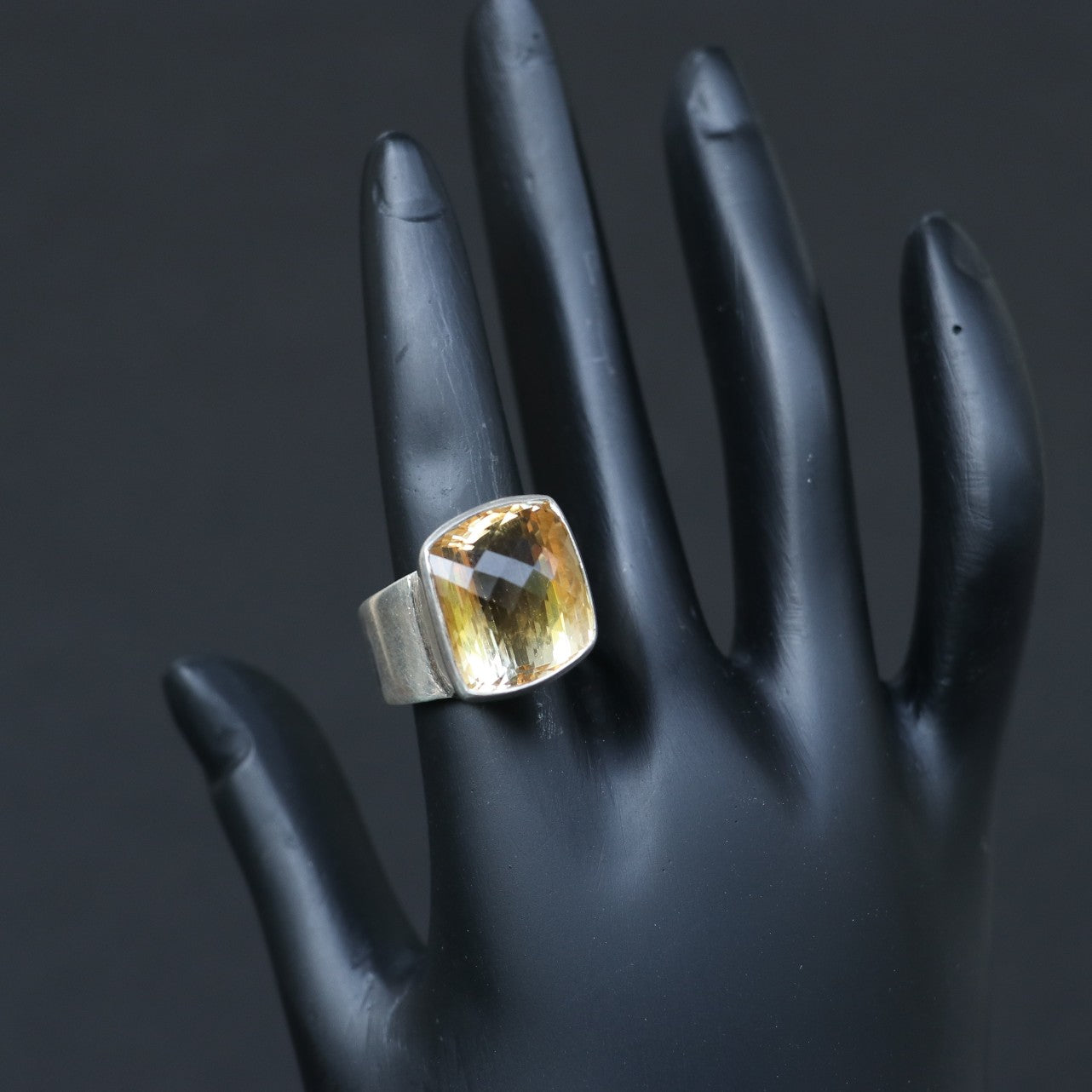 SILVER RING WITH A GOLDEN TOPAZ