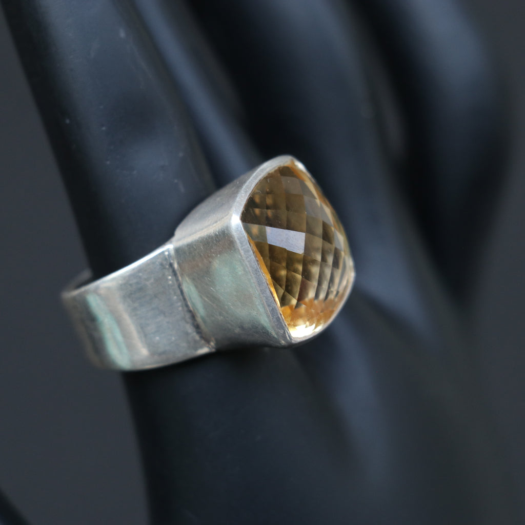 SILVER RING WITH A GOLDEN TOPAZ