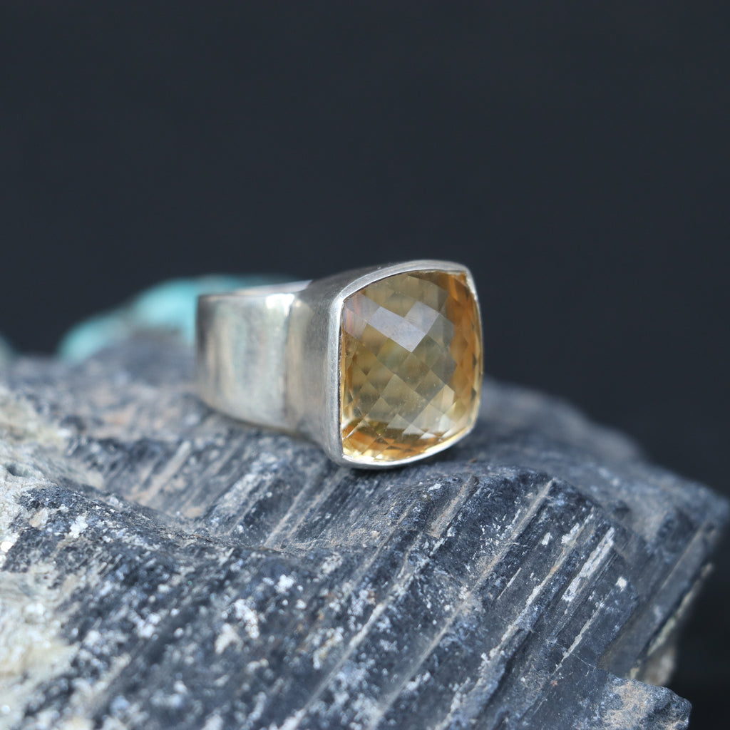 SILVER RING WITH A GOLDEN TOPAZ