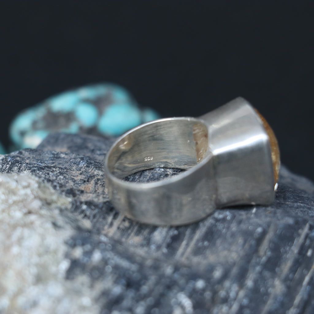 SILVER RING WITH A GOLDEN TOPAZ