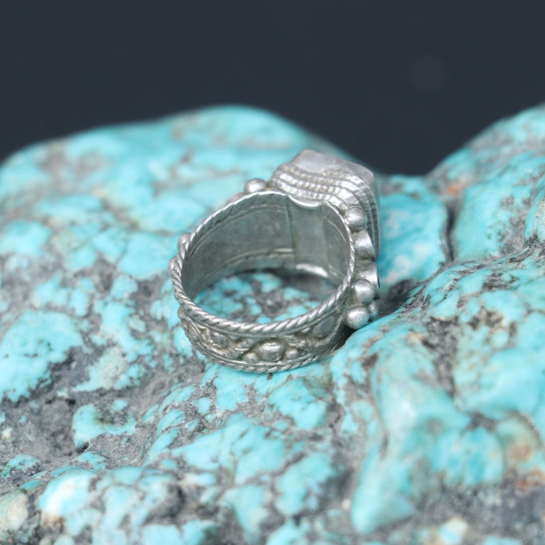 VINTAGE SILVER RING WITH A PURPLE GLASS STONE