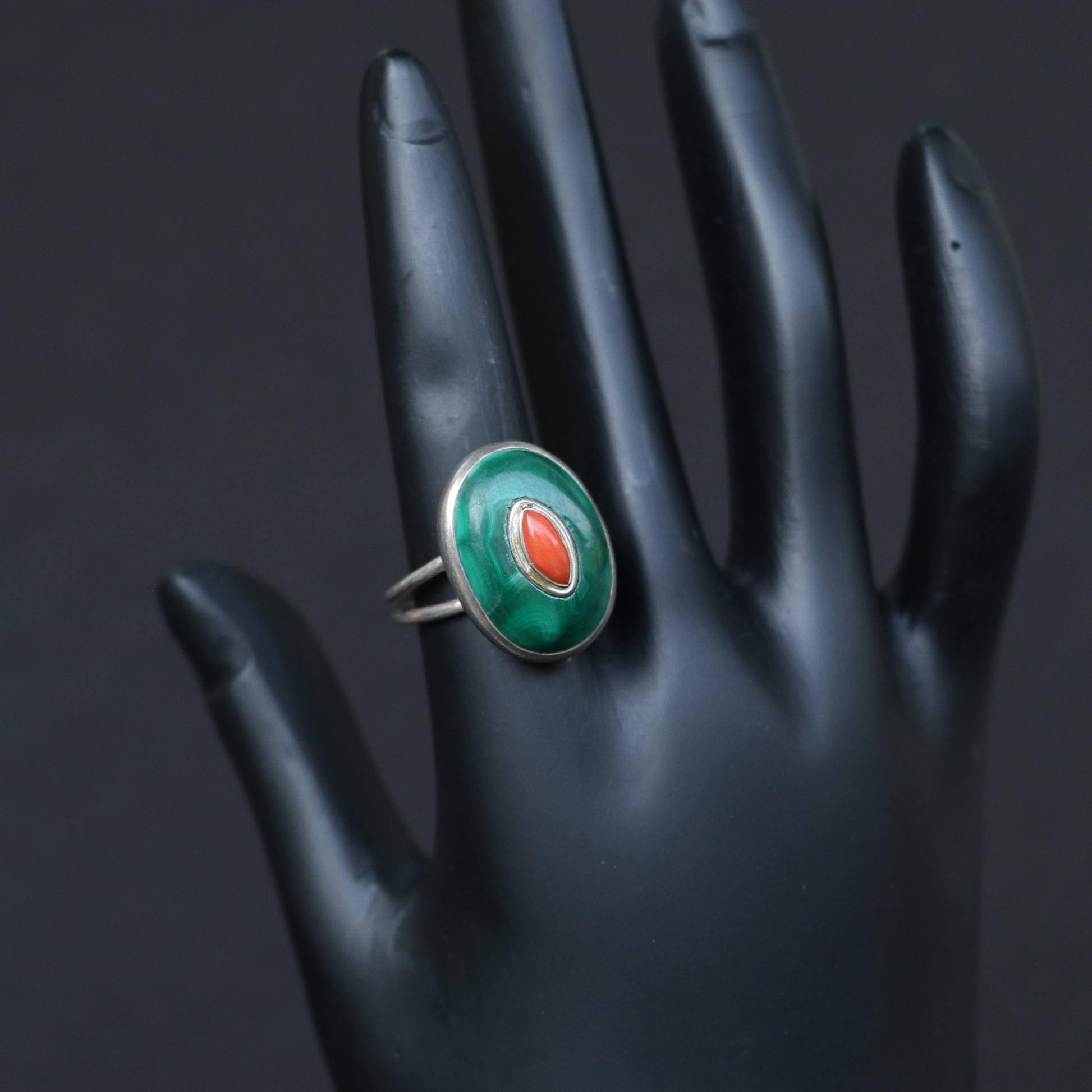 SILVER RING WITH A GREEN MALACHITE BASE , CENTERED BY RED CORAL