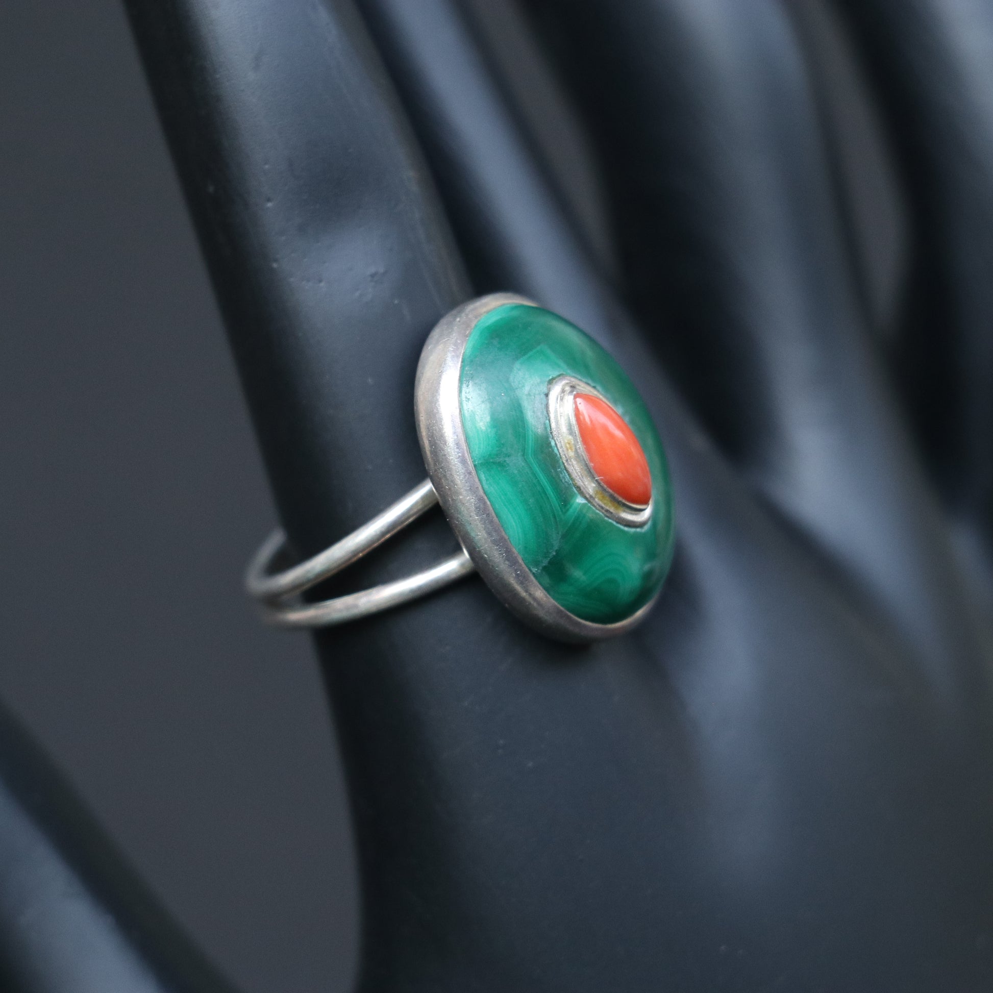 SILVER RING WITH A GREEN MALACHITE BASE , CENTERED BY RED CORAL