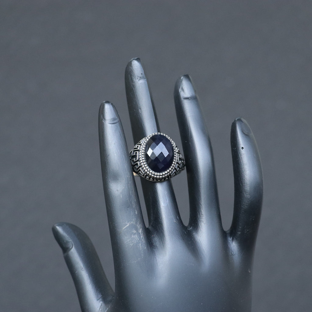 ANTIQUE SILVER RING WITH A BLACK ONYX STONE