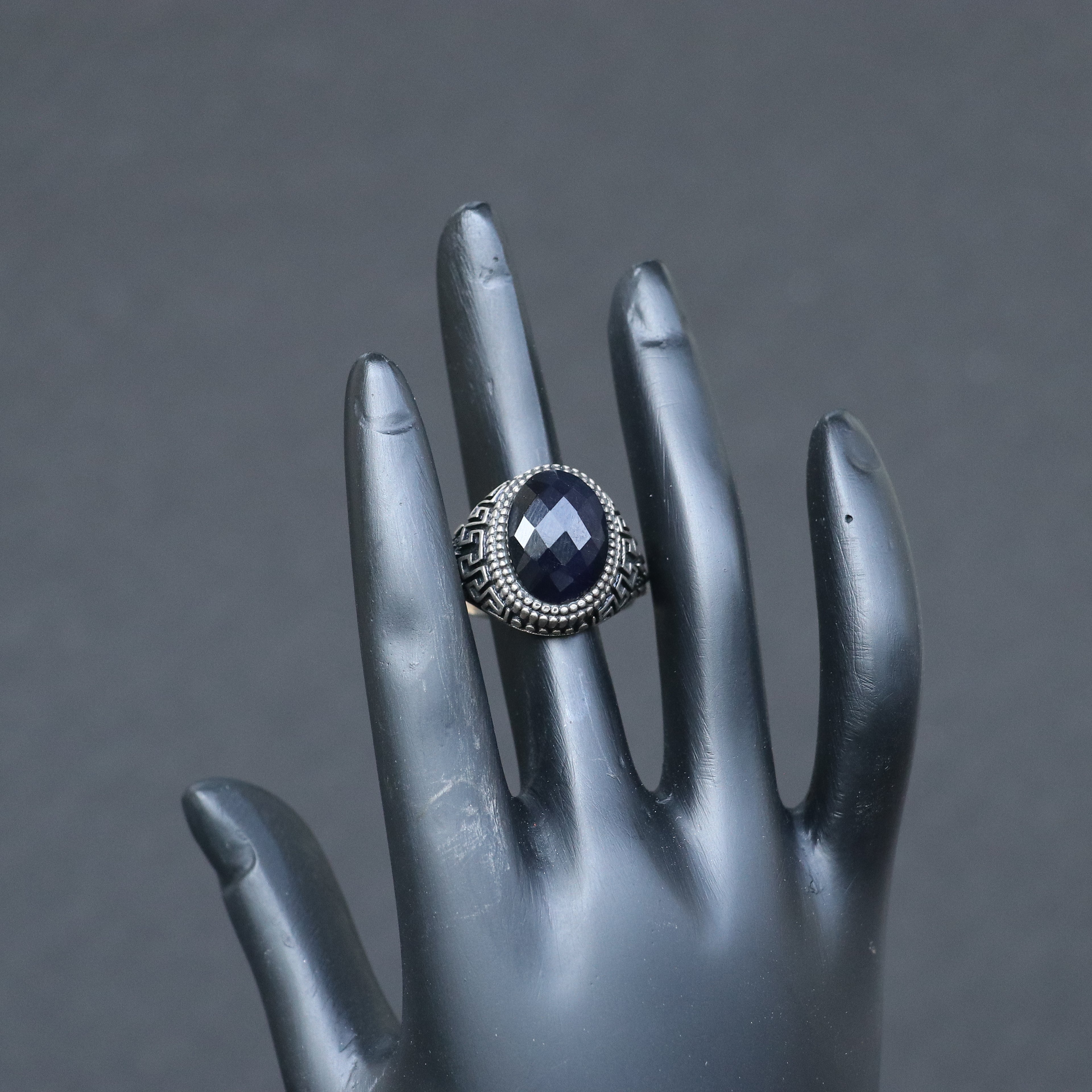 ANTIQUE SILVER RING WITH A BLACK ONYX STONE