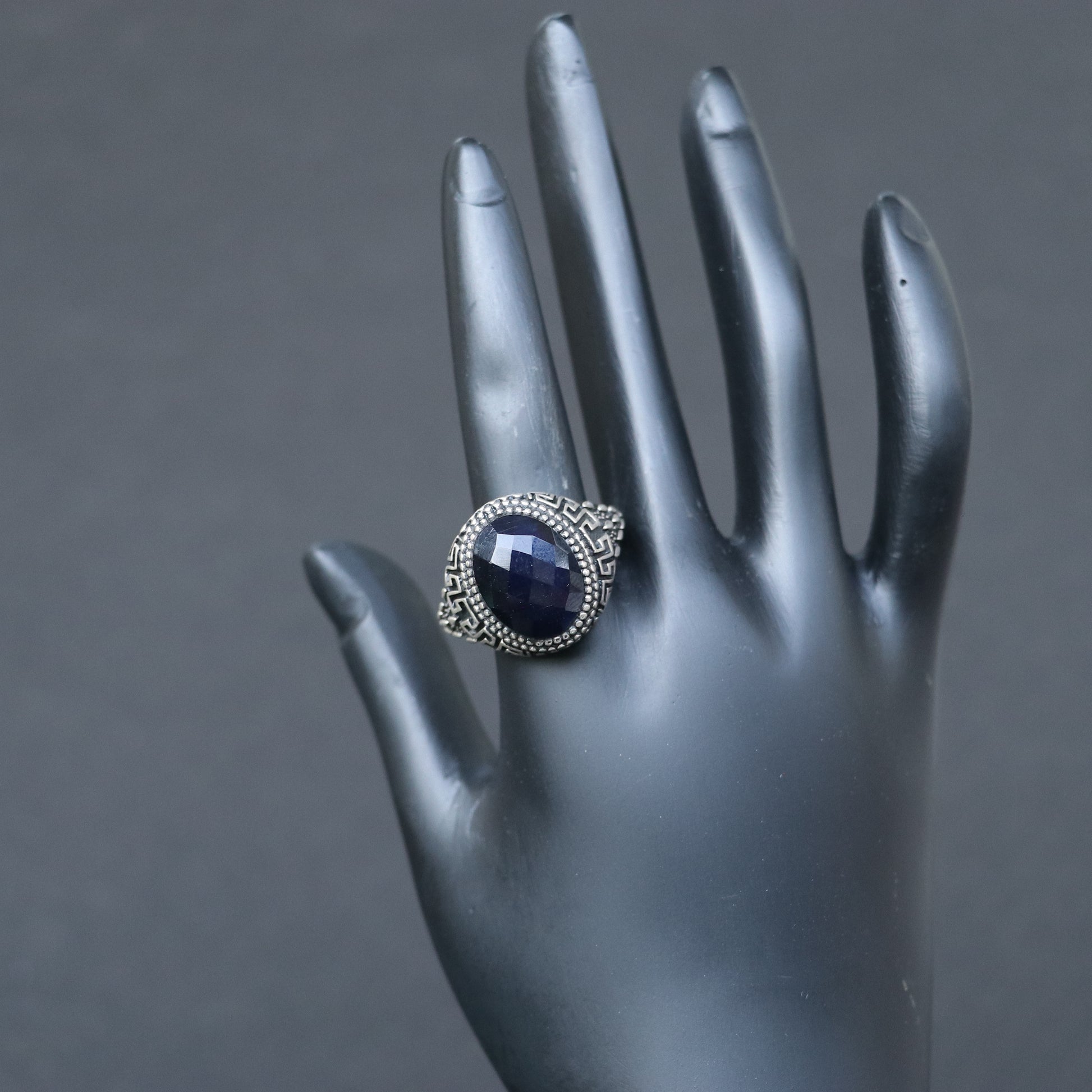 ANTIQUE SILVER RING WITH A BLACK ONYX STONE