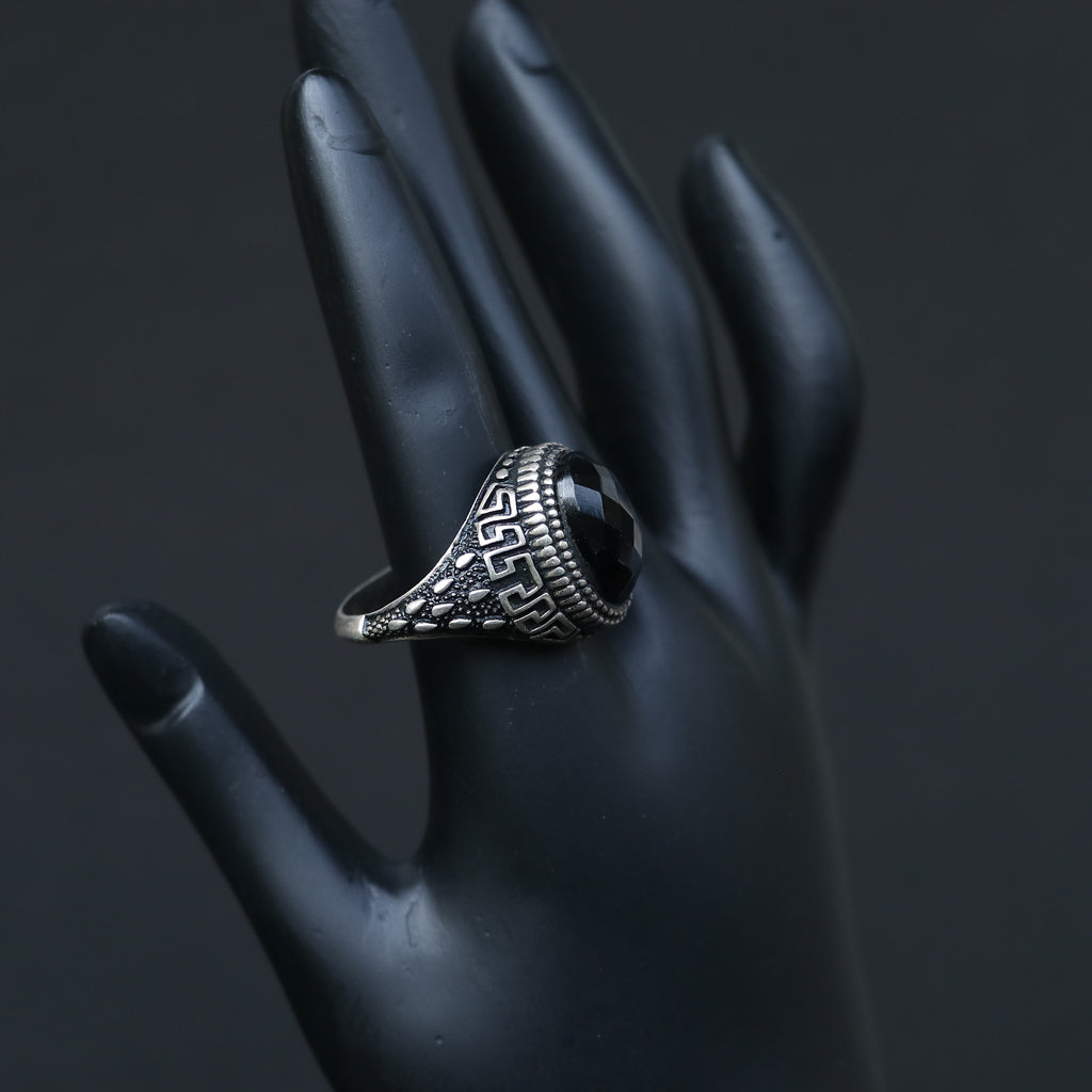 ANTIQUE SILVER RING WITH A BLACK ONYX STONE