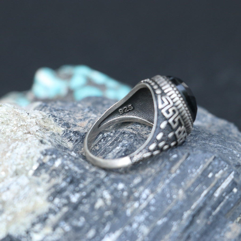ANTIQUE SILVER RING WITH A BLACK ONYX STONE