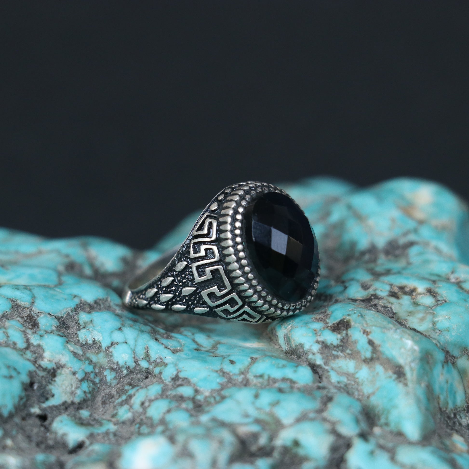 ANTIQUE SILVER RING WITH A BLACK ONYX STONE