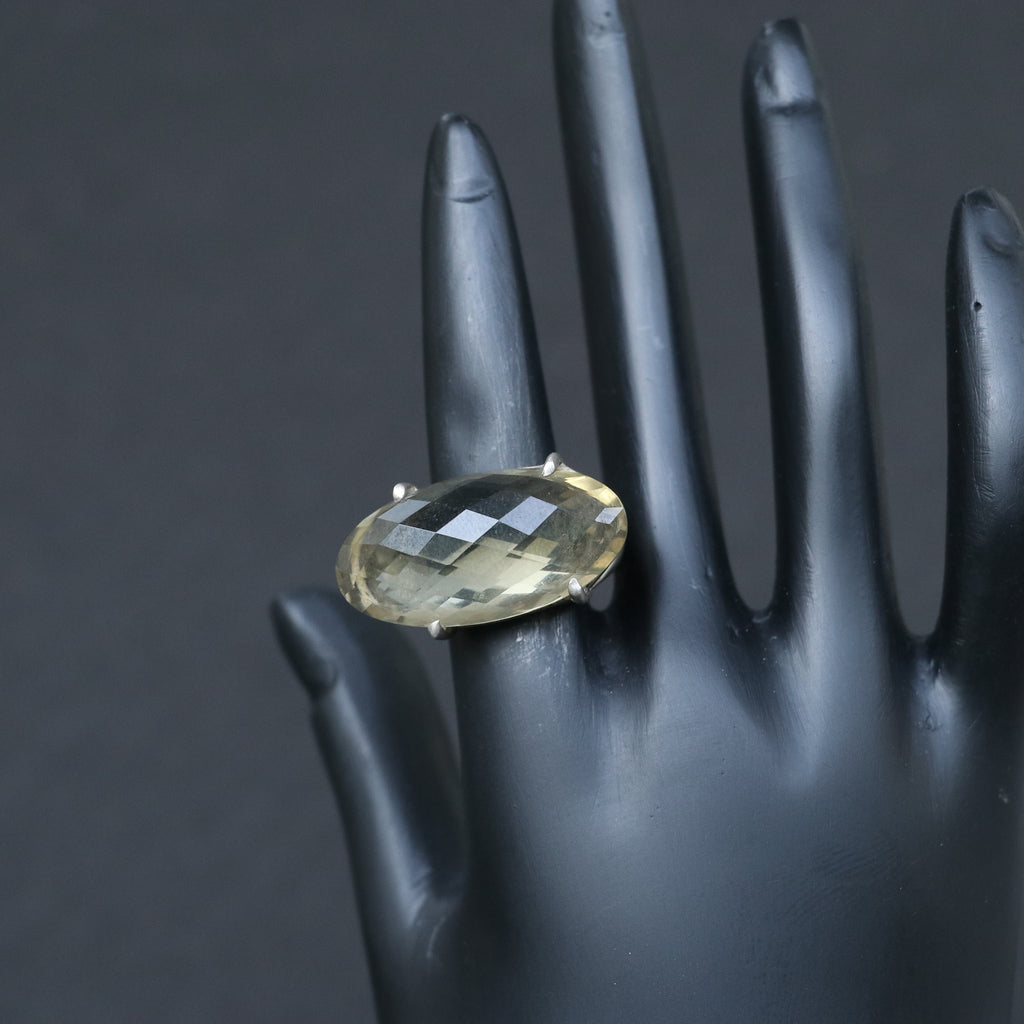 SILVER RING WITH AN OVAL GOLDEN TOPAZ