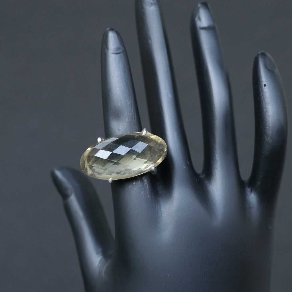 SILVER RING WITH AN OVAL GOLDEN TOPAZ