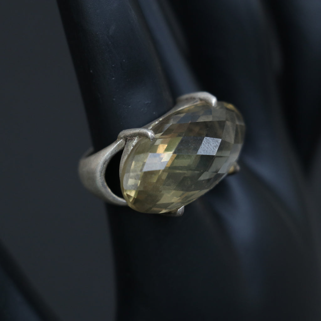 SILVER RING WITH AN OVAL GOLDEN TOPAZ