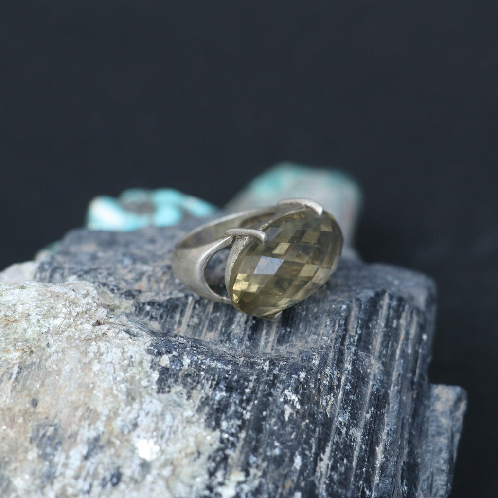 SILVER RING WITH AN OVAL GOLDEN TOPAZ