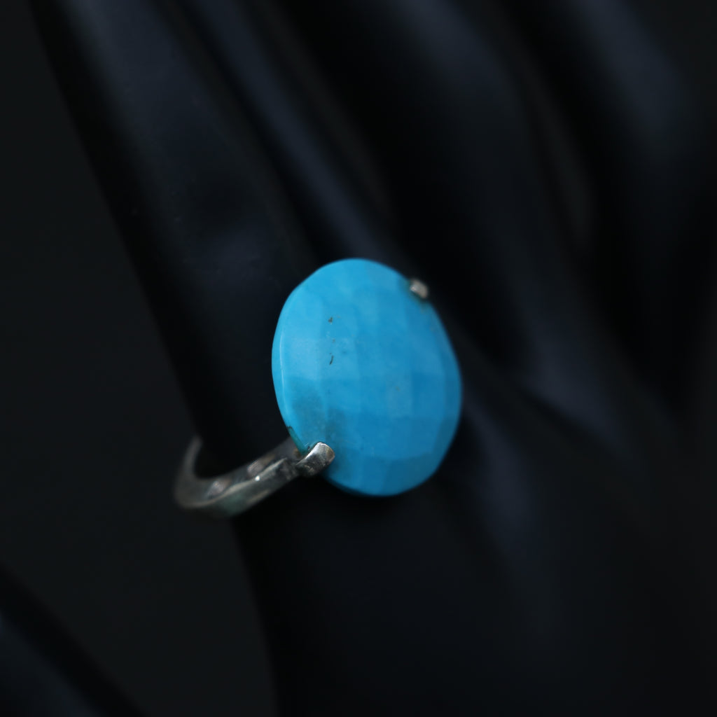 SILVER RING WITH A ROUND BLUE AGATE