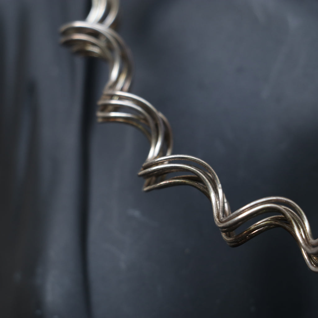 SILVER CHOKER WITH A SCULPTURAL DESIGN