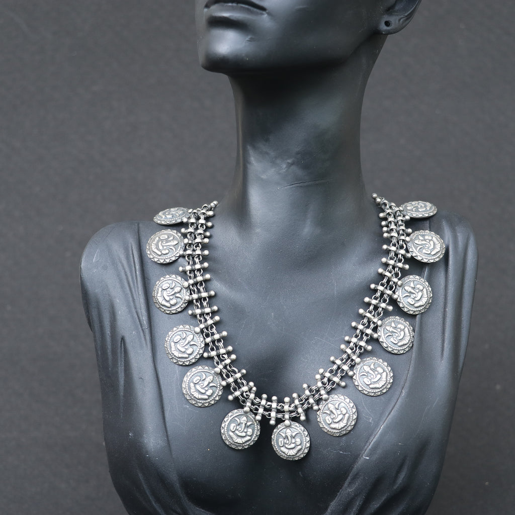 SILVER NECKLACE WITH LAYERED CHAIN DESIGN AND ENGRAVED COIN SHAPE GANESH