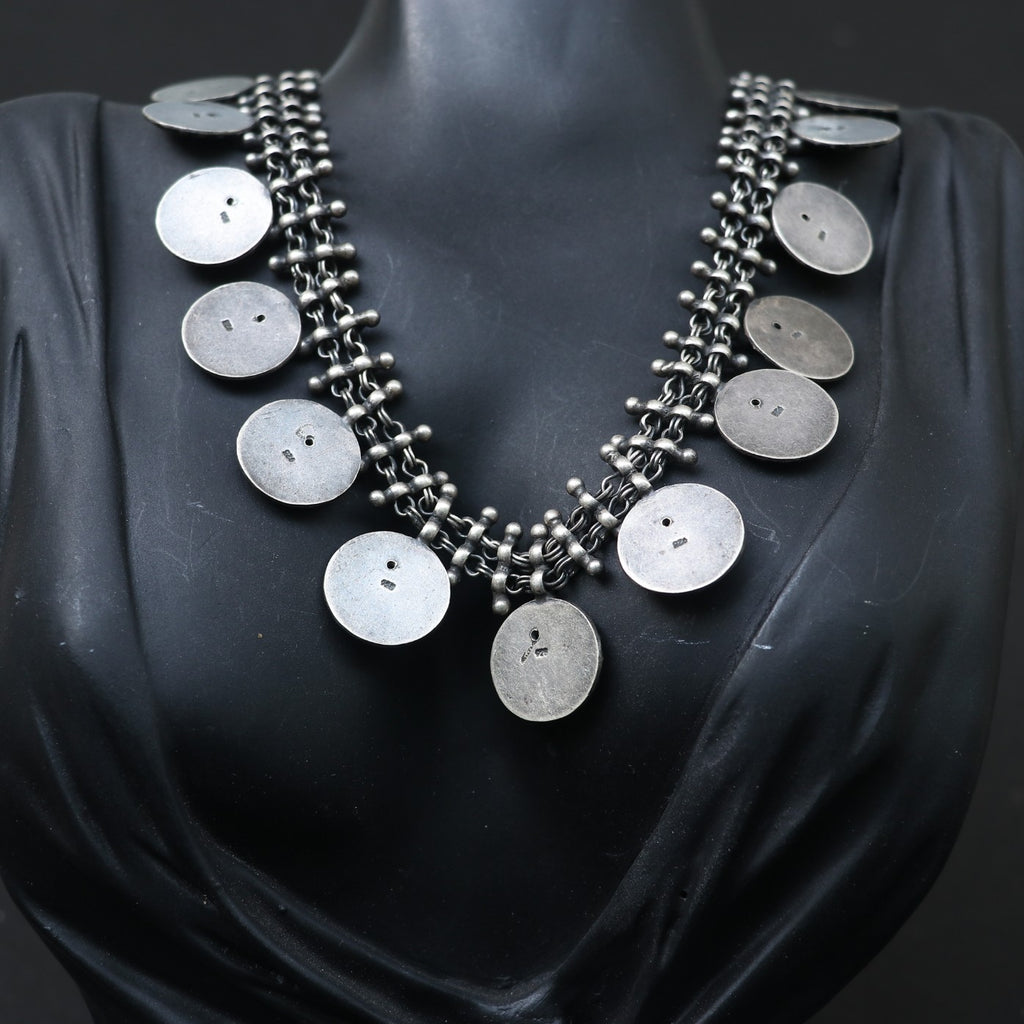 SILVER NECKLACE WITH LAYERED CHAIN DESIGN AND ENGRAVED COIN SHAPE GANESH
