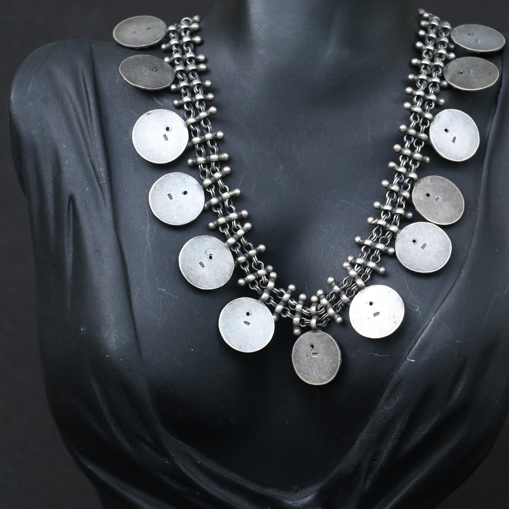 SILVER NECKLACE WITH LAYERED CHAIN DESIGN AND ENGRAVED COIN SHAPE GANESH