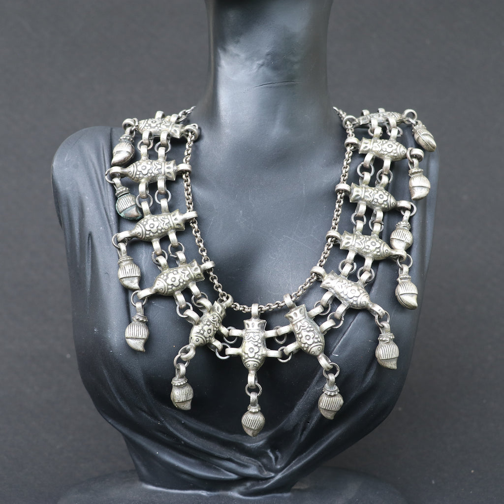 ANTIQUE STYLE SILVER NECKLACE WITH INTRICATE FISH DESIGN