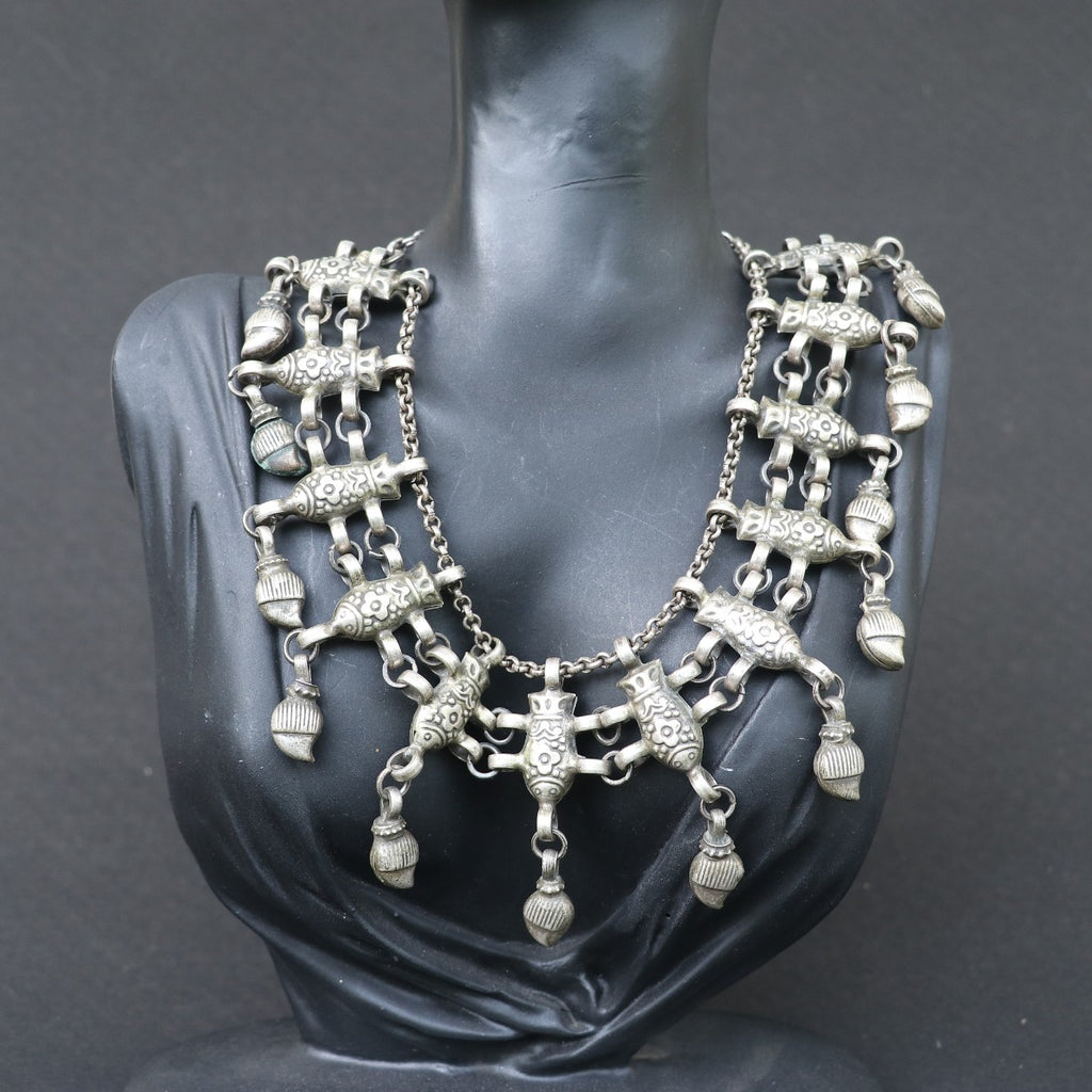 ANTIQUE STYLE SILVER NECKLACE WITH INTRICATE FISH DESIGN