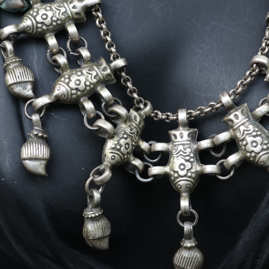 ANTIQUE STYLE SILVER NECKLACE WITH INTRICATE FISH DESIGN