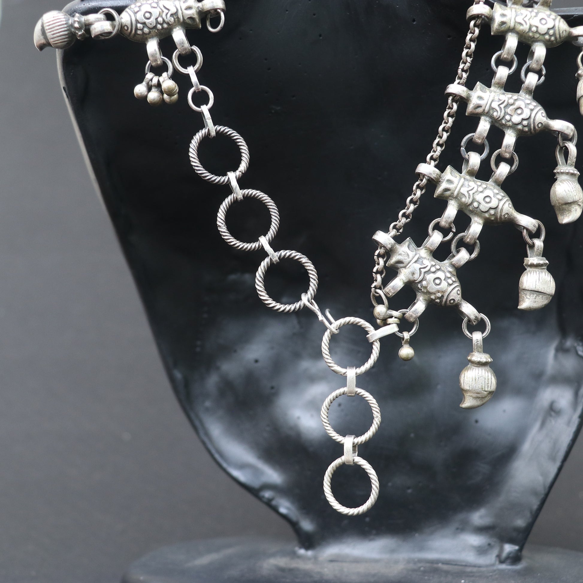 ANTIQUE STYLE SILVER NECKLACE WITH INTRICATE FISH DESIGN