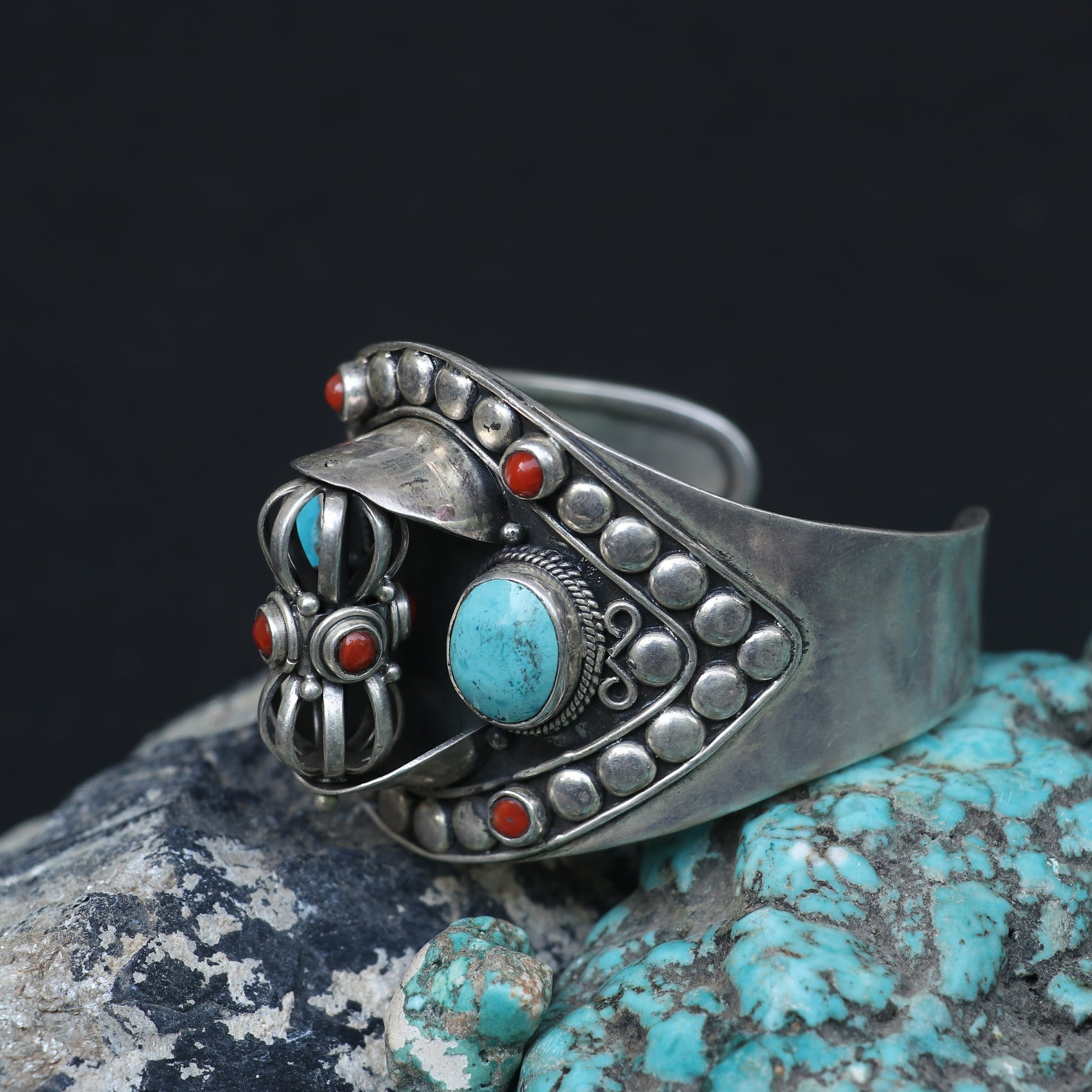 SILVER NEPALI STYLE KADA FEATURING TURQUOISE AND CORAL STONES