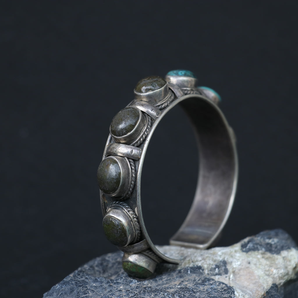 SILVER KADA FEATURING OVAL TURQUOISES AND GREEN GEMSTONES