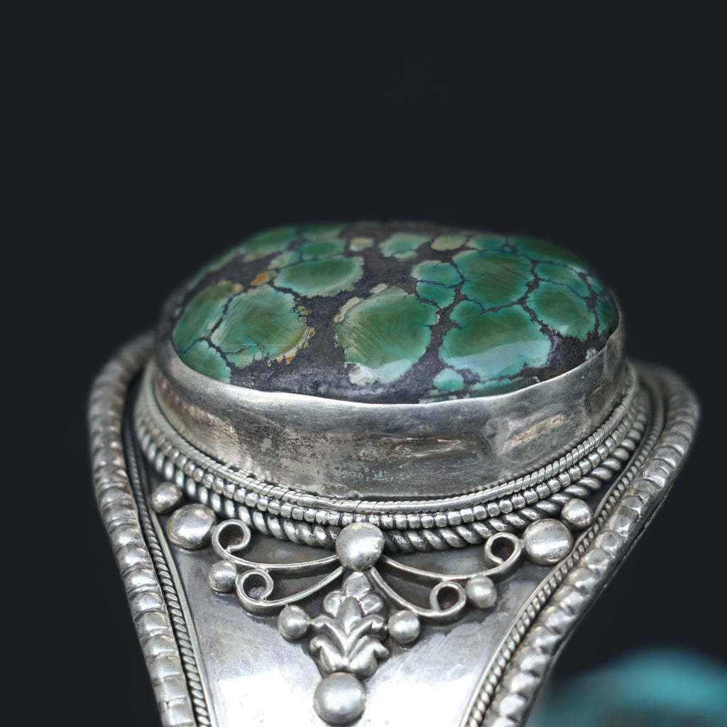 SILVER KADA FEATURING A LARGE TURQUOISE