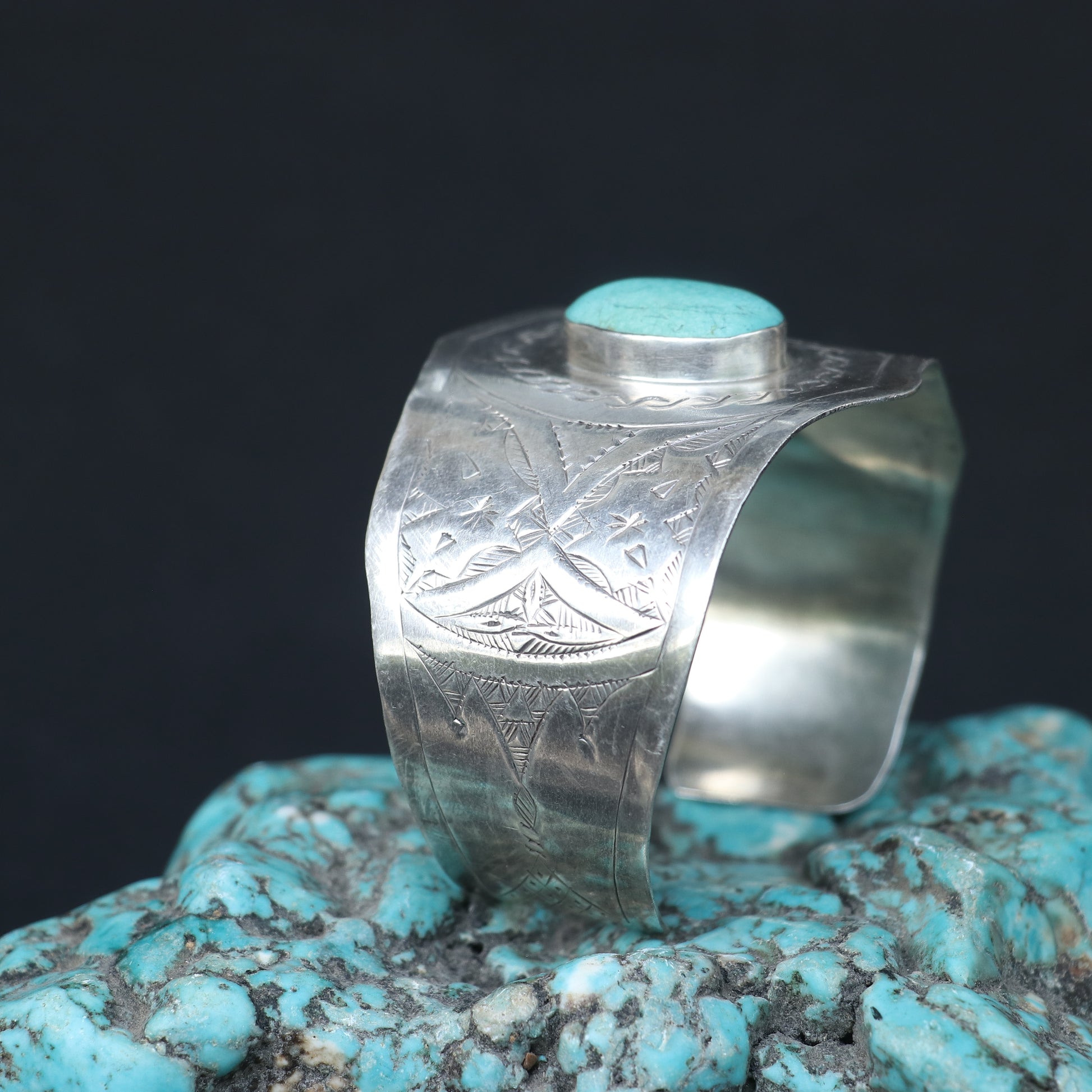 SILVER KADA FEATURING A ROUND TURQUOISE