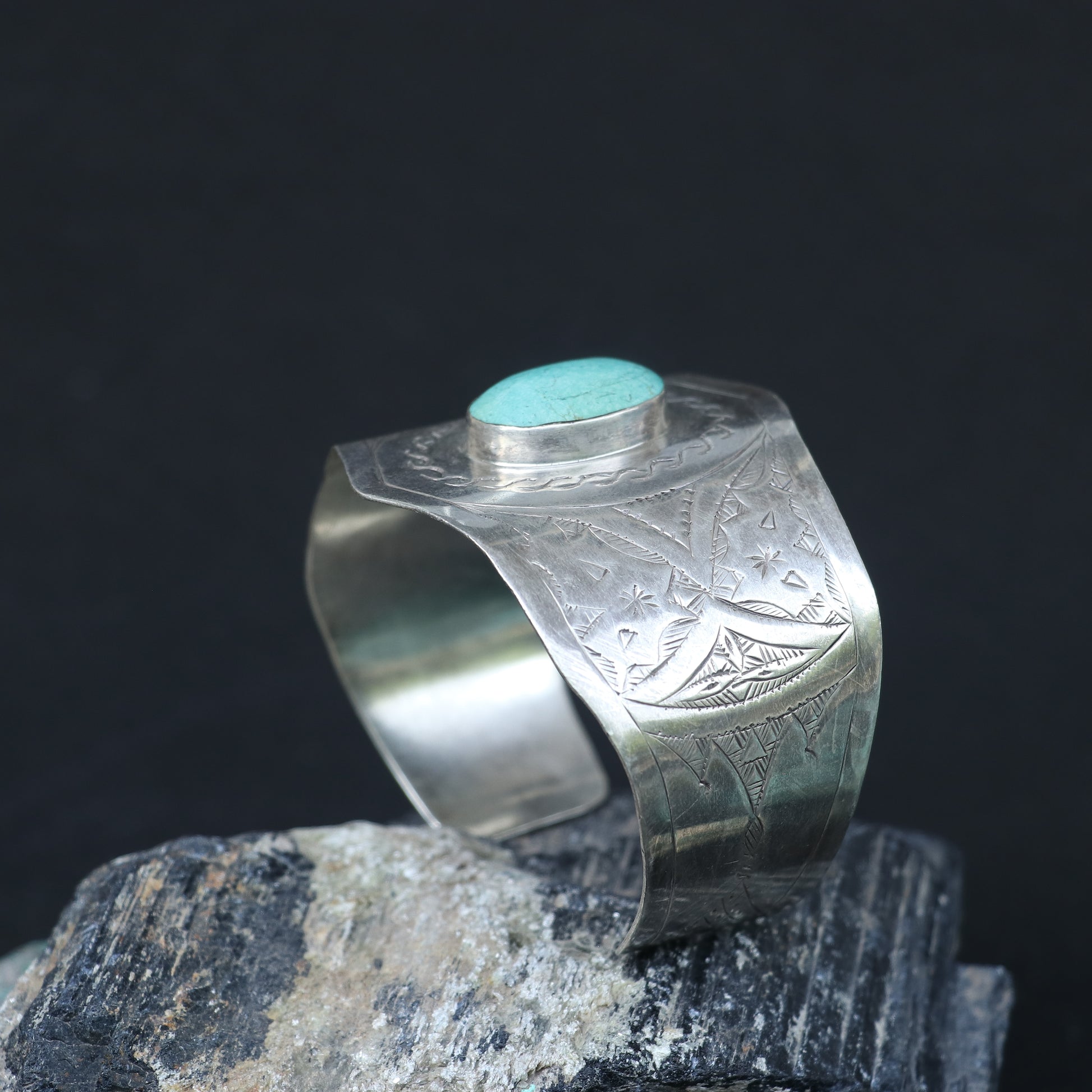 SILVER KADA FEATURING A ROUND TURQUOISE