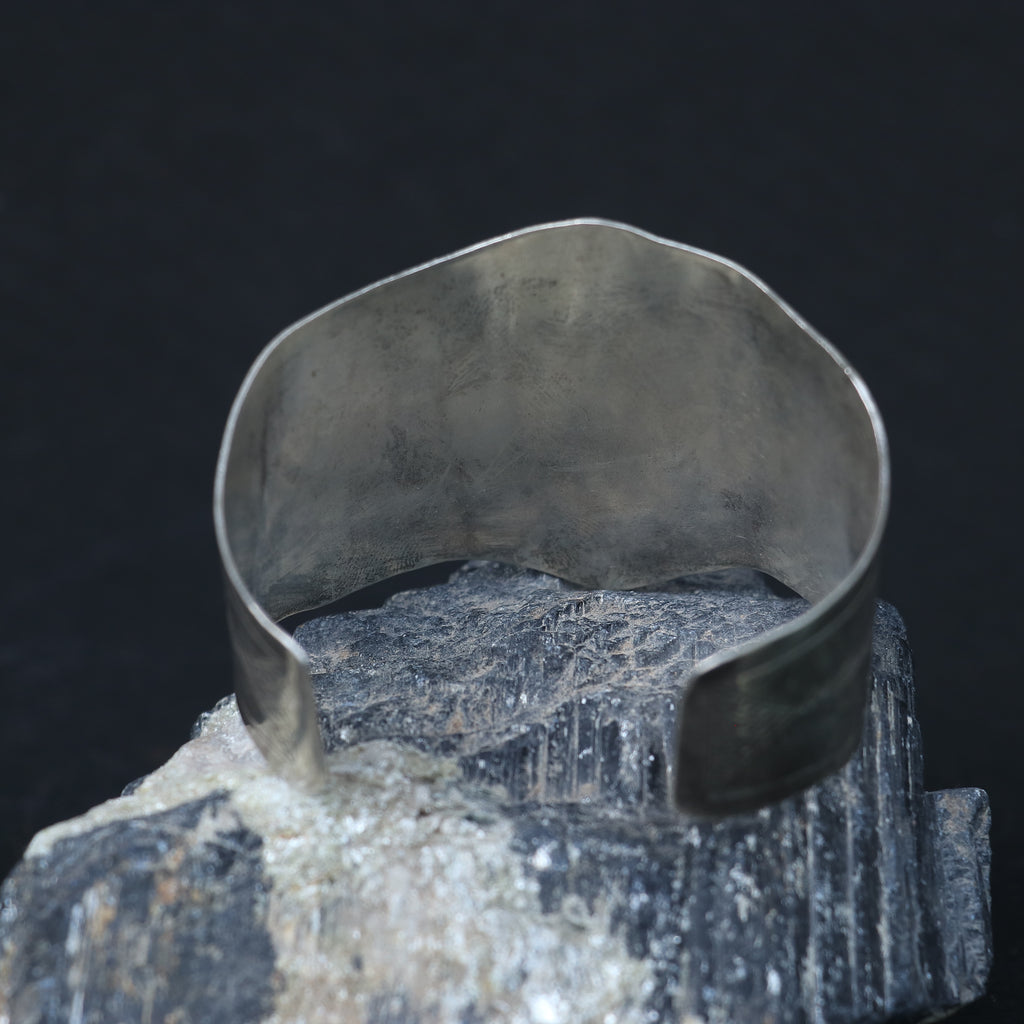 SILVER KADA FEATURING A ROUND TURQUOISE