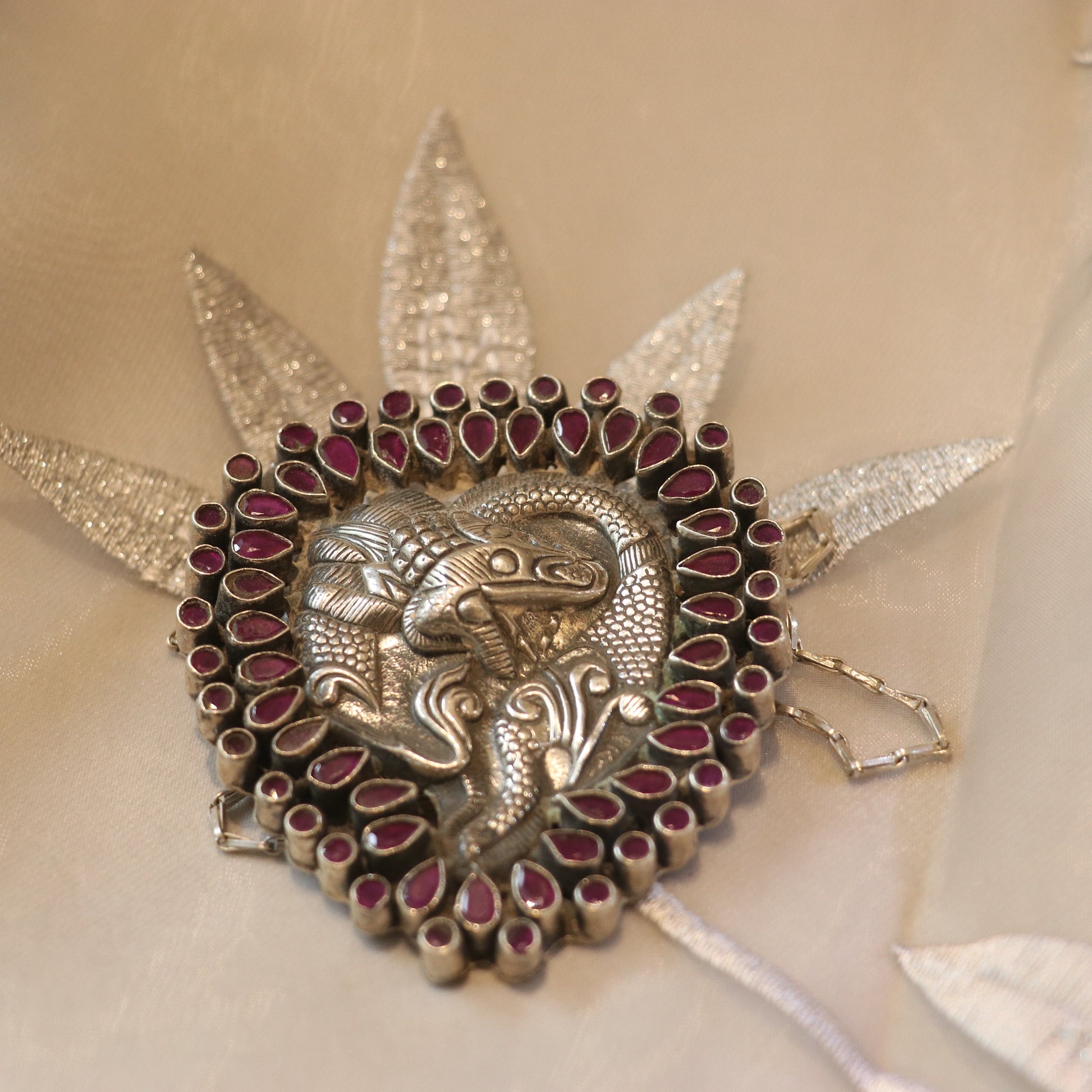 SILVER TWIN FISH PENDANT WITH BANGOK RUBY STONES