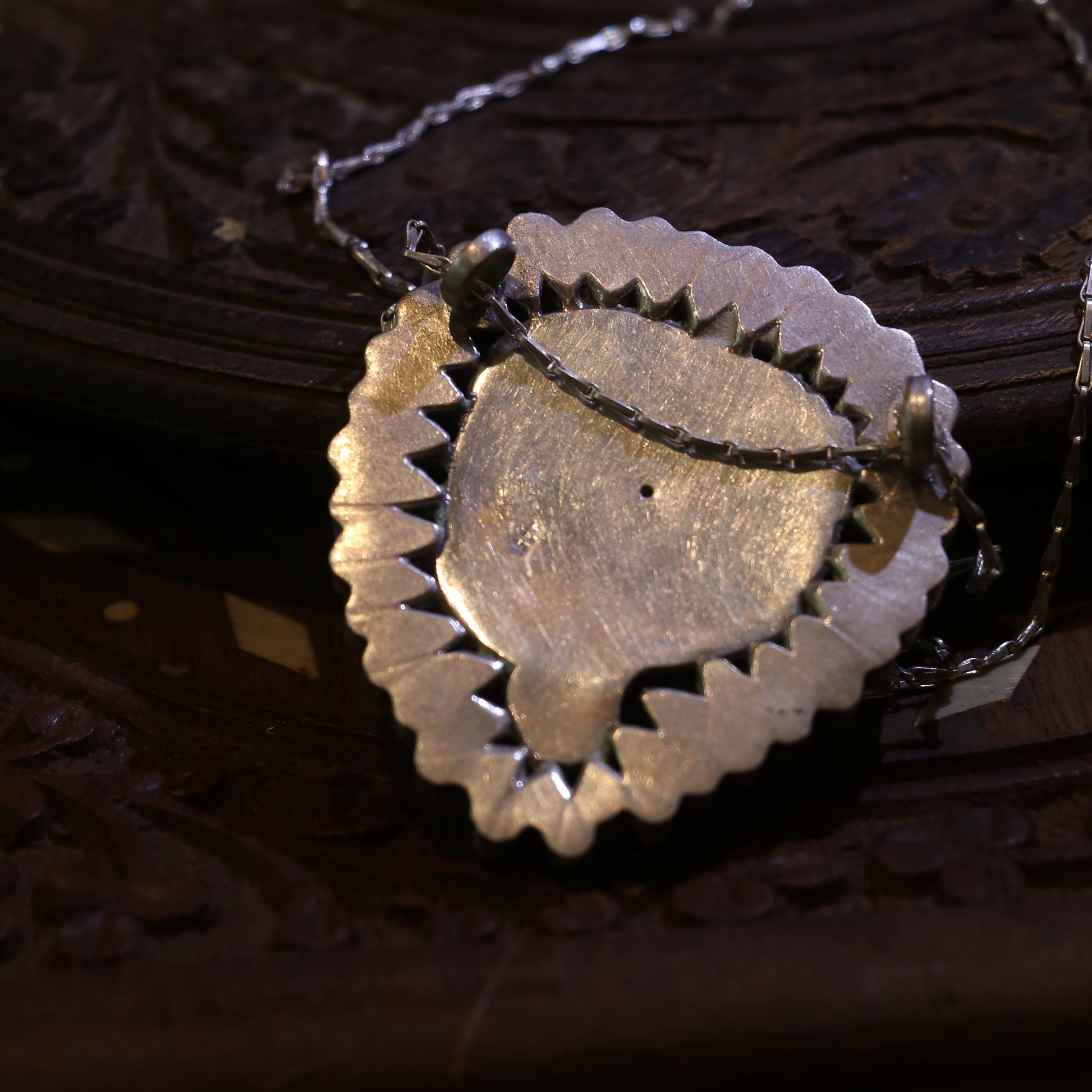 SILVER TWIN FISH PENDANT WITH BANGOK RUBY STONES