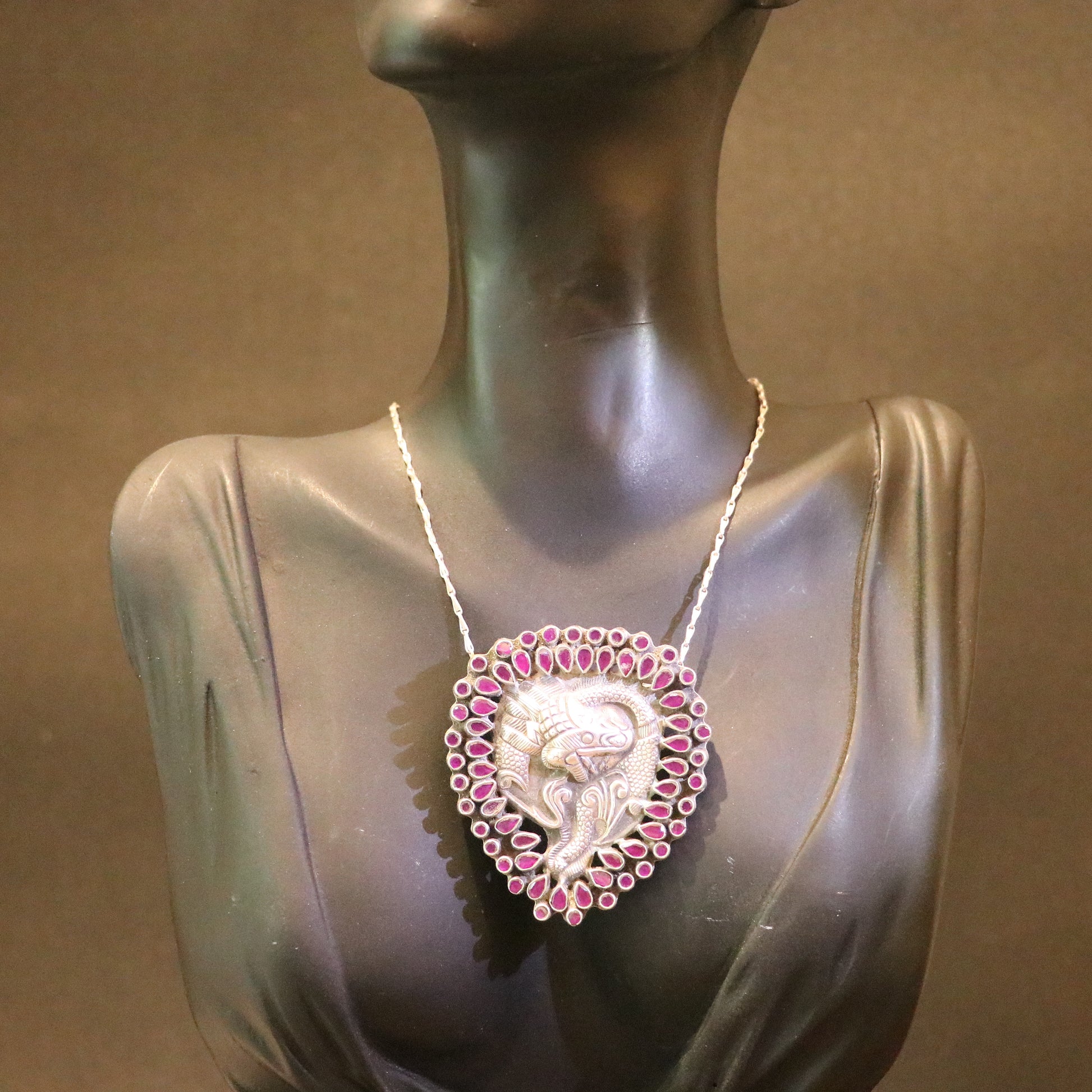 SILVER TWIN FISH PENDANT WITH BANGOK RUBY STONES