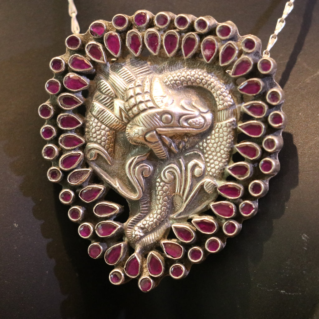 SILVER TWIN FISH PENDANT WITH BANGOK RUBY STONES