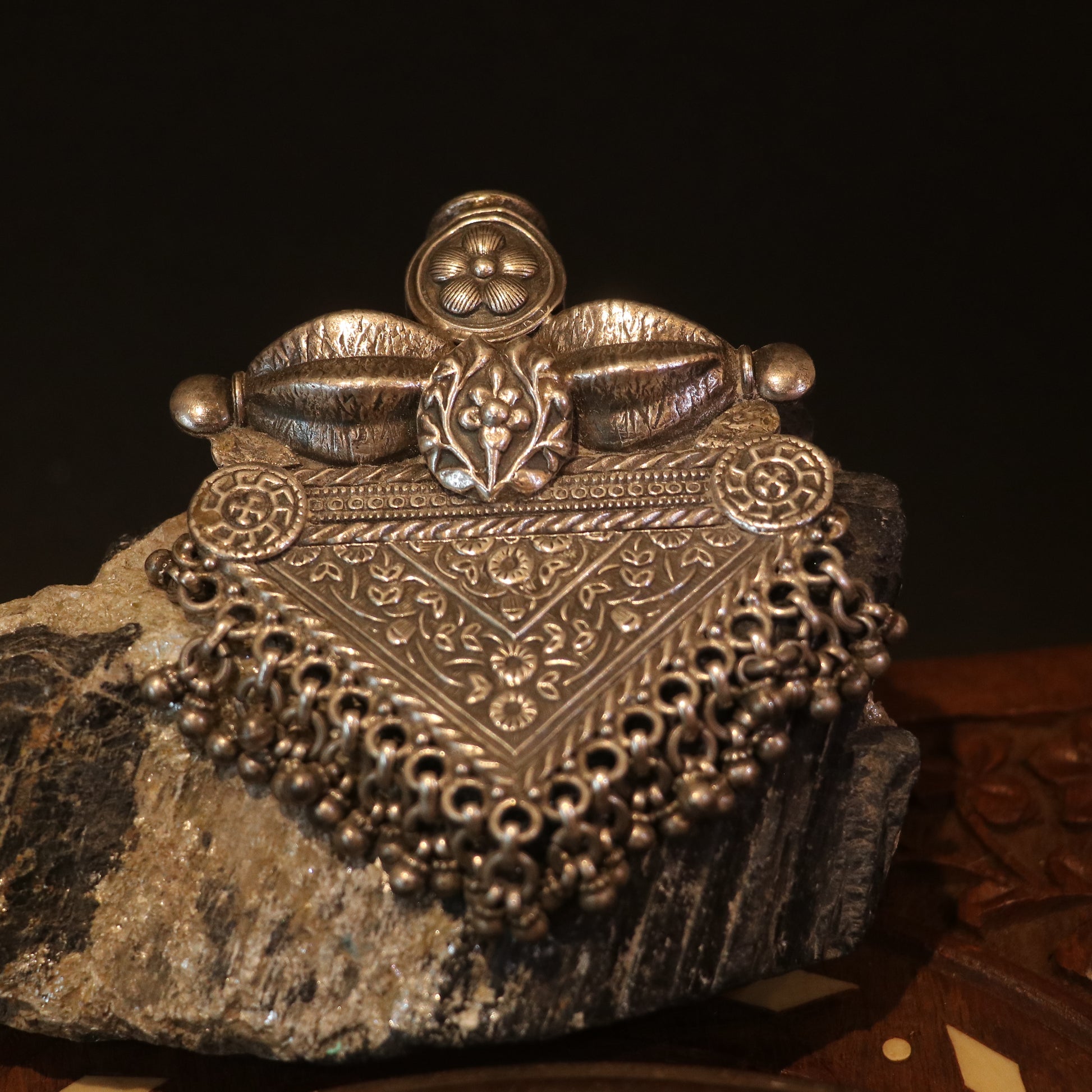 SILVER PENDANT WITH FLORAL CRAVINGS AND HANGING BEADS