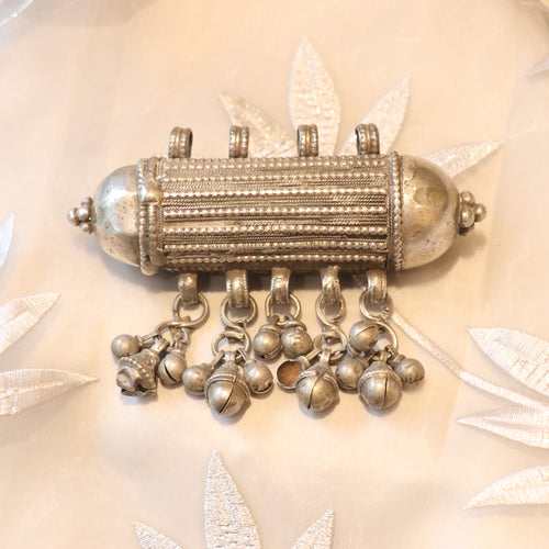ANTIQUE CYLINDRICAL SILVER AMULET WITH GHUNGROO STYLE BALLS