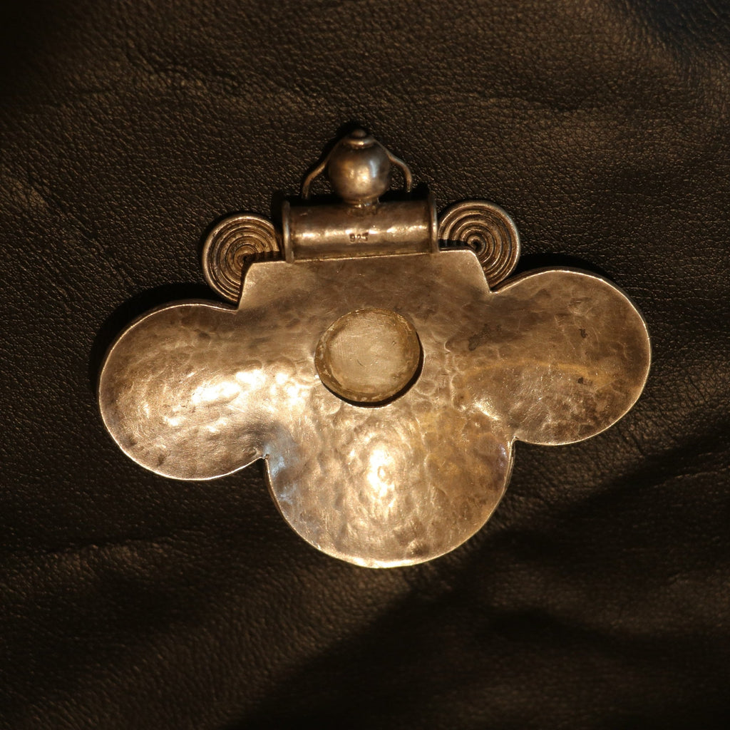 HANDCRAFTED SILVER PENDANT WITH A HAMMERED TEXTURE