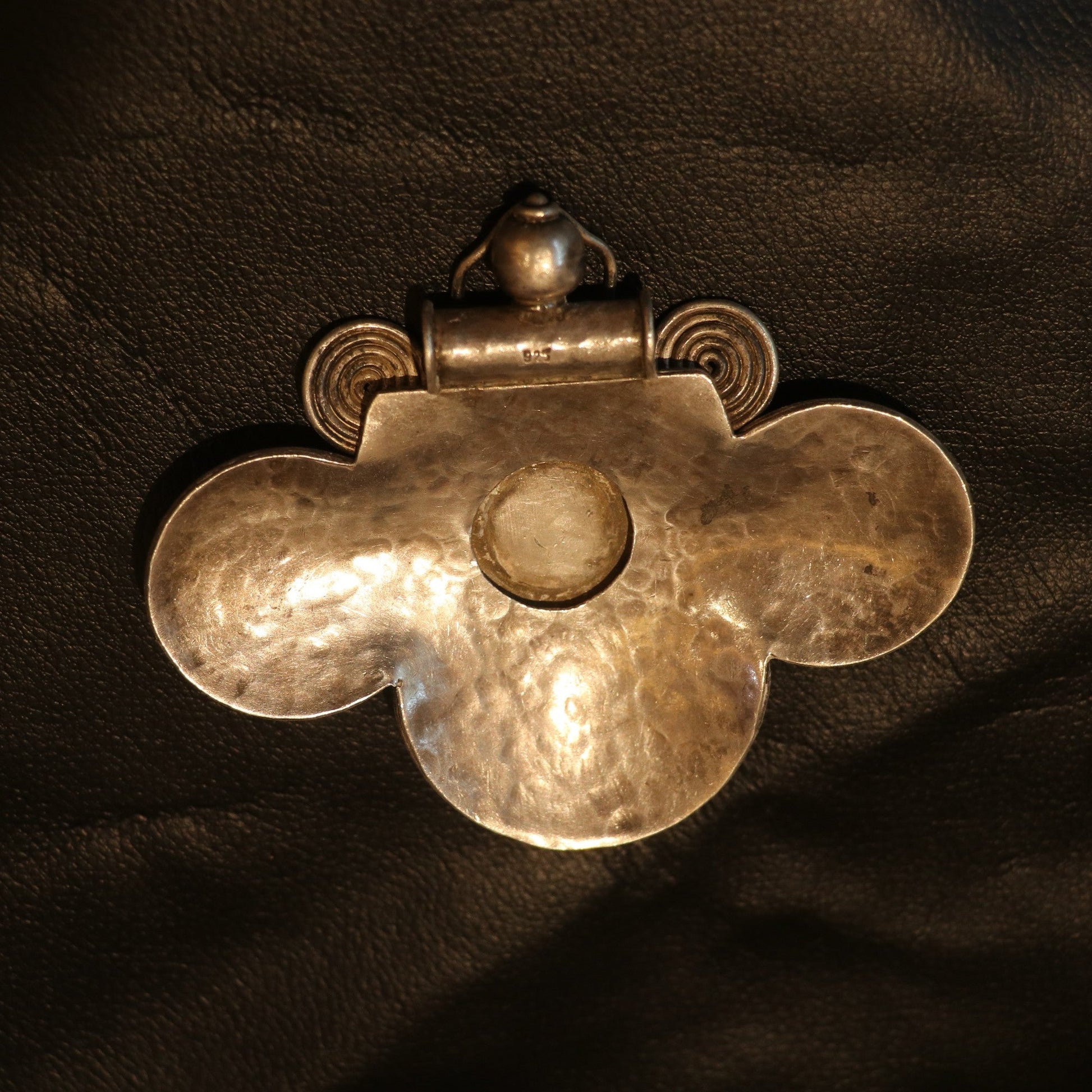 HANDCRAFTED SILVER PENDANT WITH A HAMMERED TEXTURE