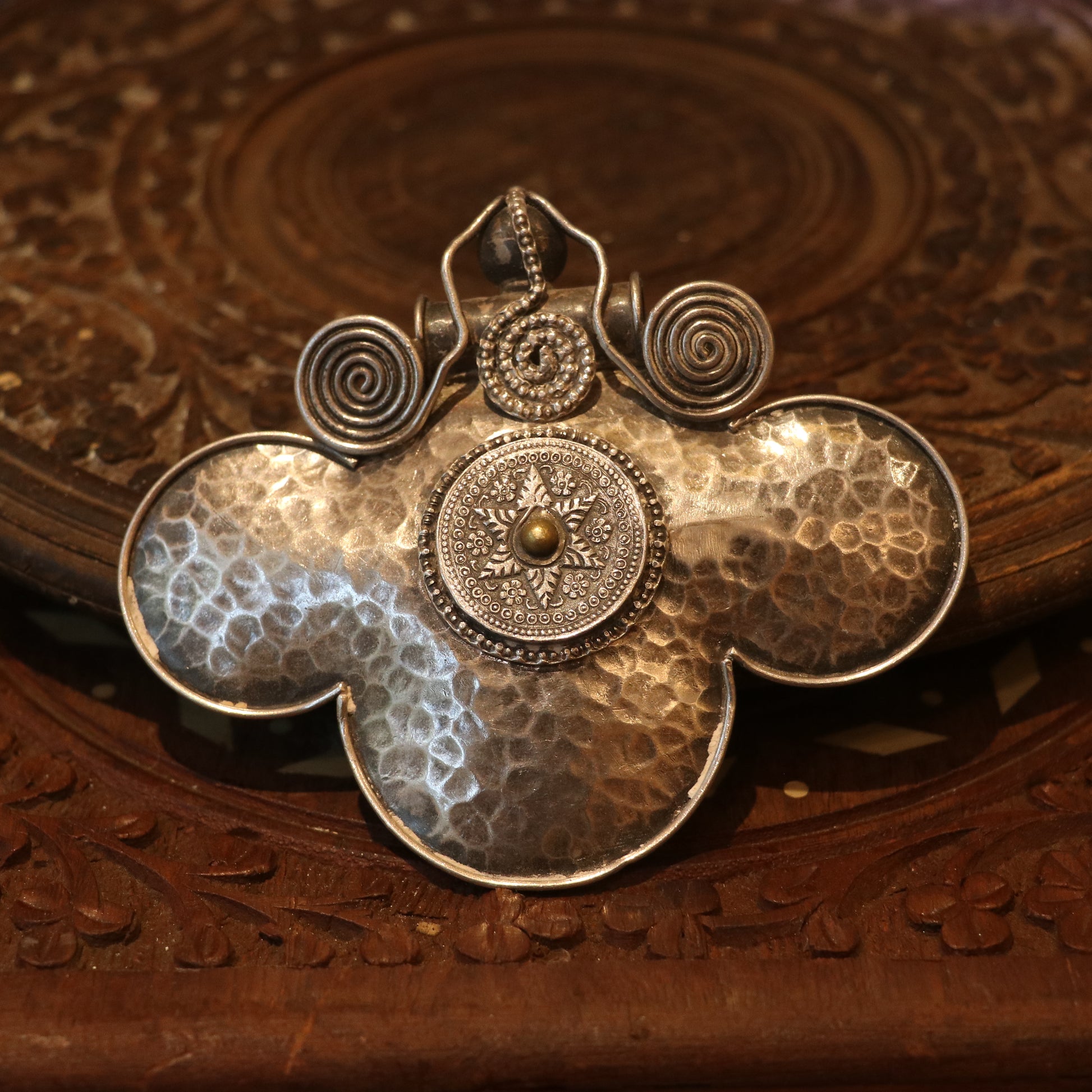 HANDCRAFTED SILVER PENDANT WITH A HAMMERED TEXTURE